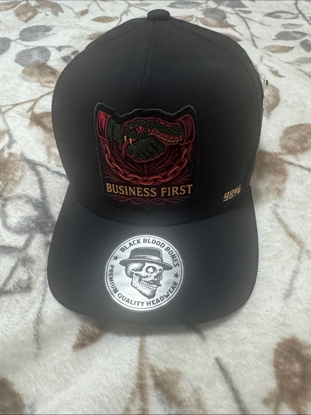 Business First Black Cap with Embroidered Snake Patch